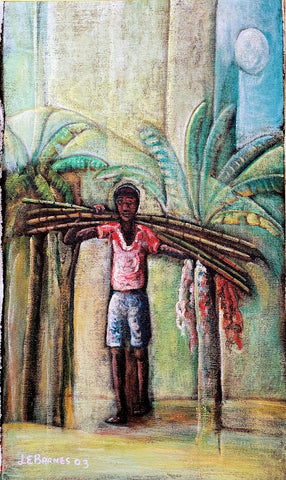 Jamaican boy carrying sugarcane on his back. 